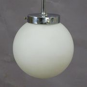 Functionalist suspension in Bauhaus style with opaline glass shade.