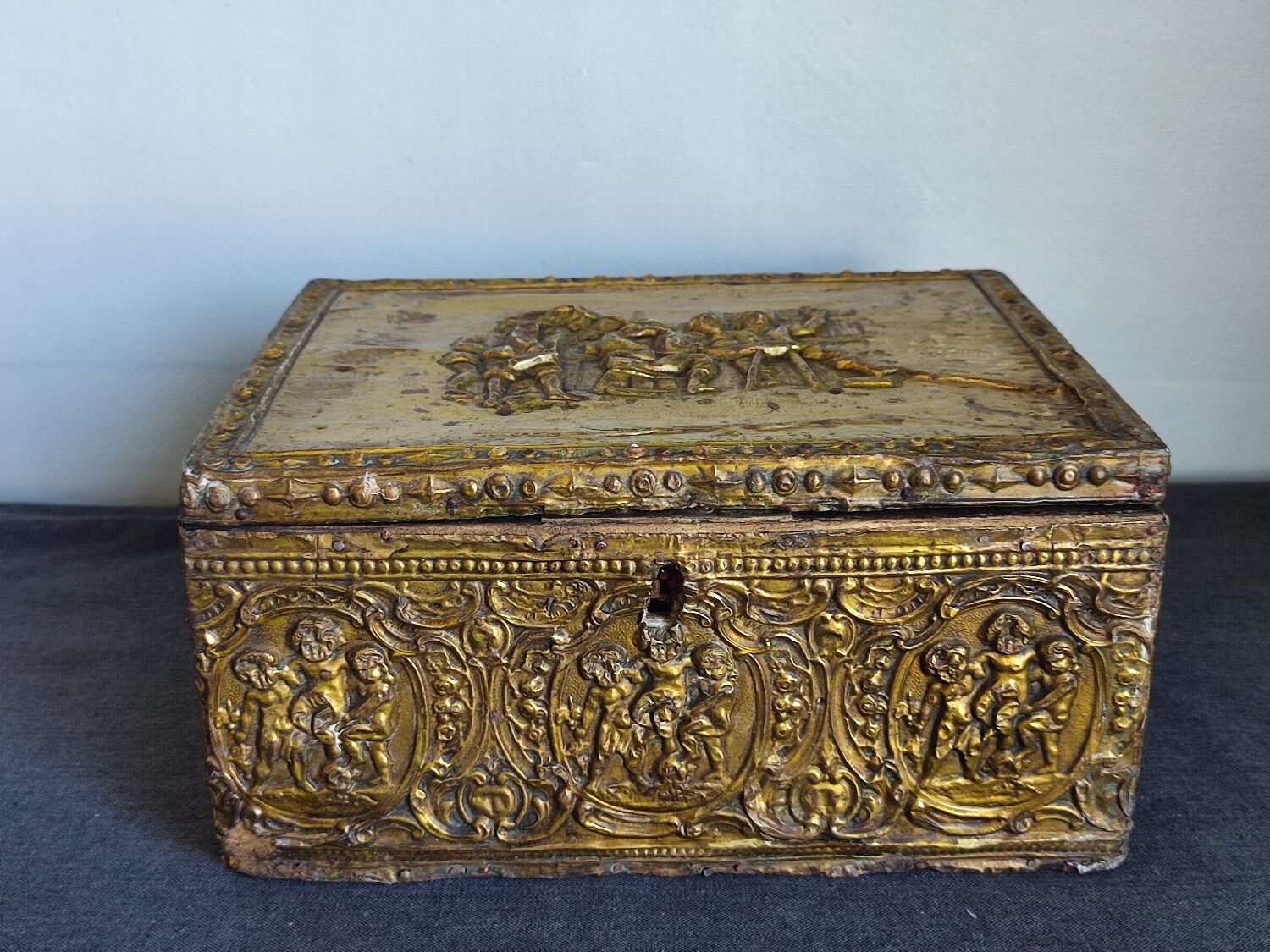 Old wooden box/casket covered with brass