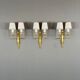 Set of three Louis XVI style wall sconces in gilded bronze, 20th century.