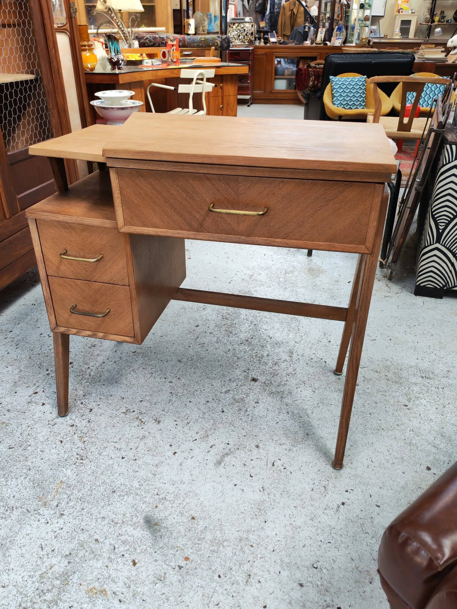 Vintage 1950s side desk with tapered legs.