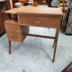 Vintage 1950s side desk with tapered legs.