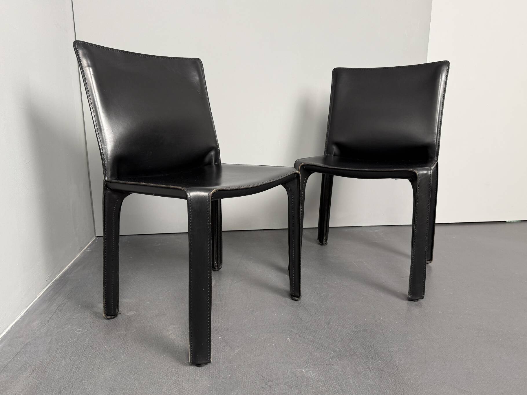 Pair of Cab 412 chairs, saddle leather, by Mario Bellini for Cassina, Italy, 1970s