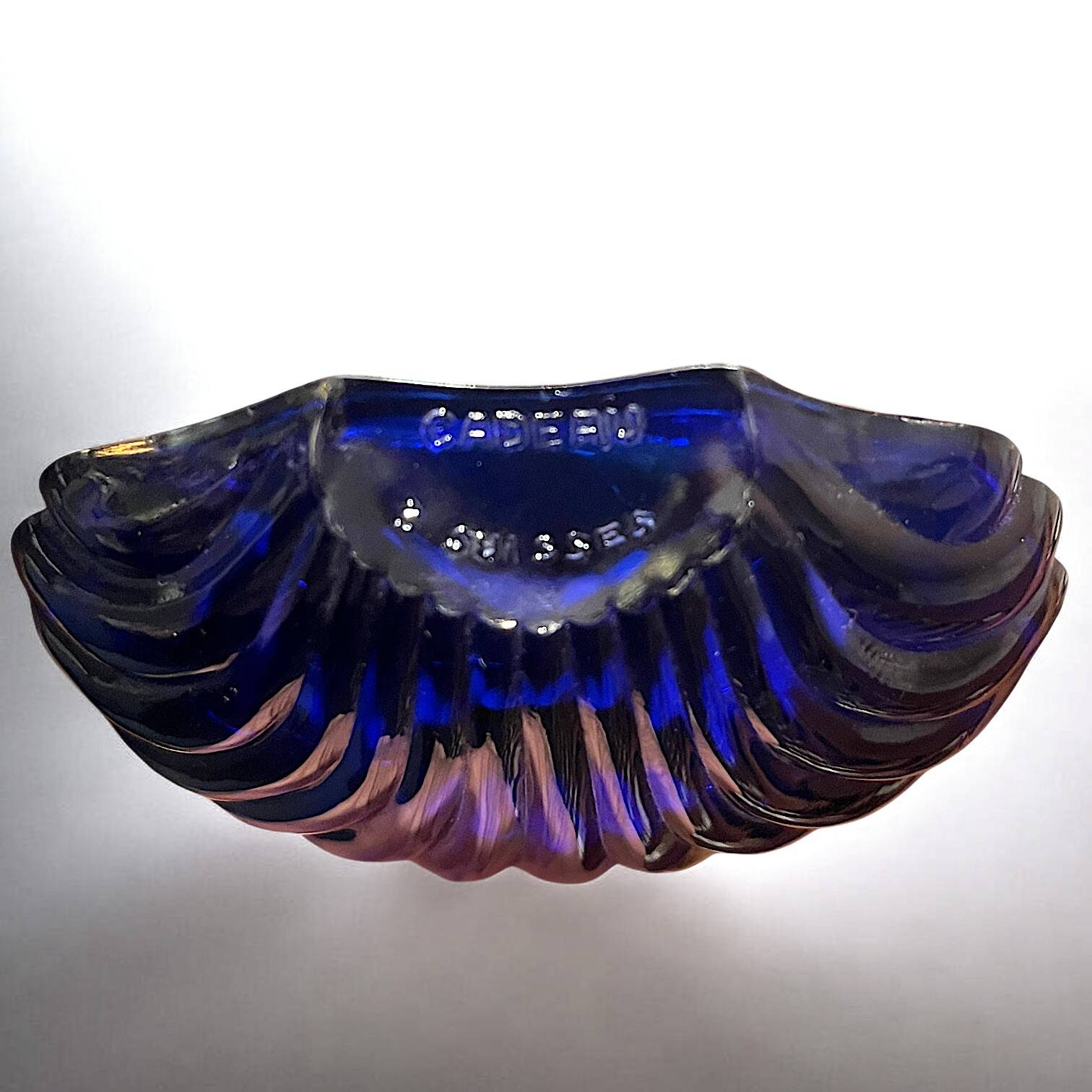 Silver-plated shell butter dish and vintage blue bowl from the 70s.