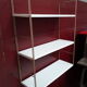 Golden Tomado shelf and white trays 1970