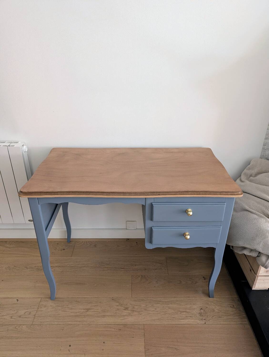 Blue wooden desk ready for its new life.