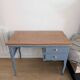 Blue wooden desk ready for its new life.