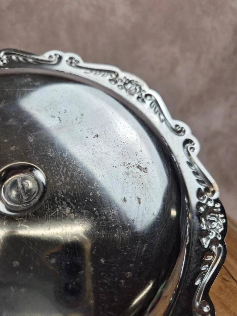 Small vintage round display stand in chrome metal – rococo style