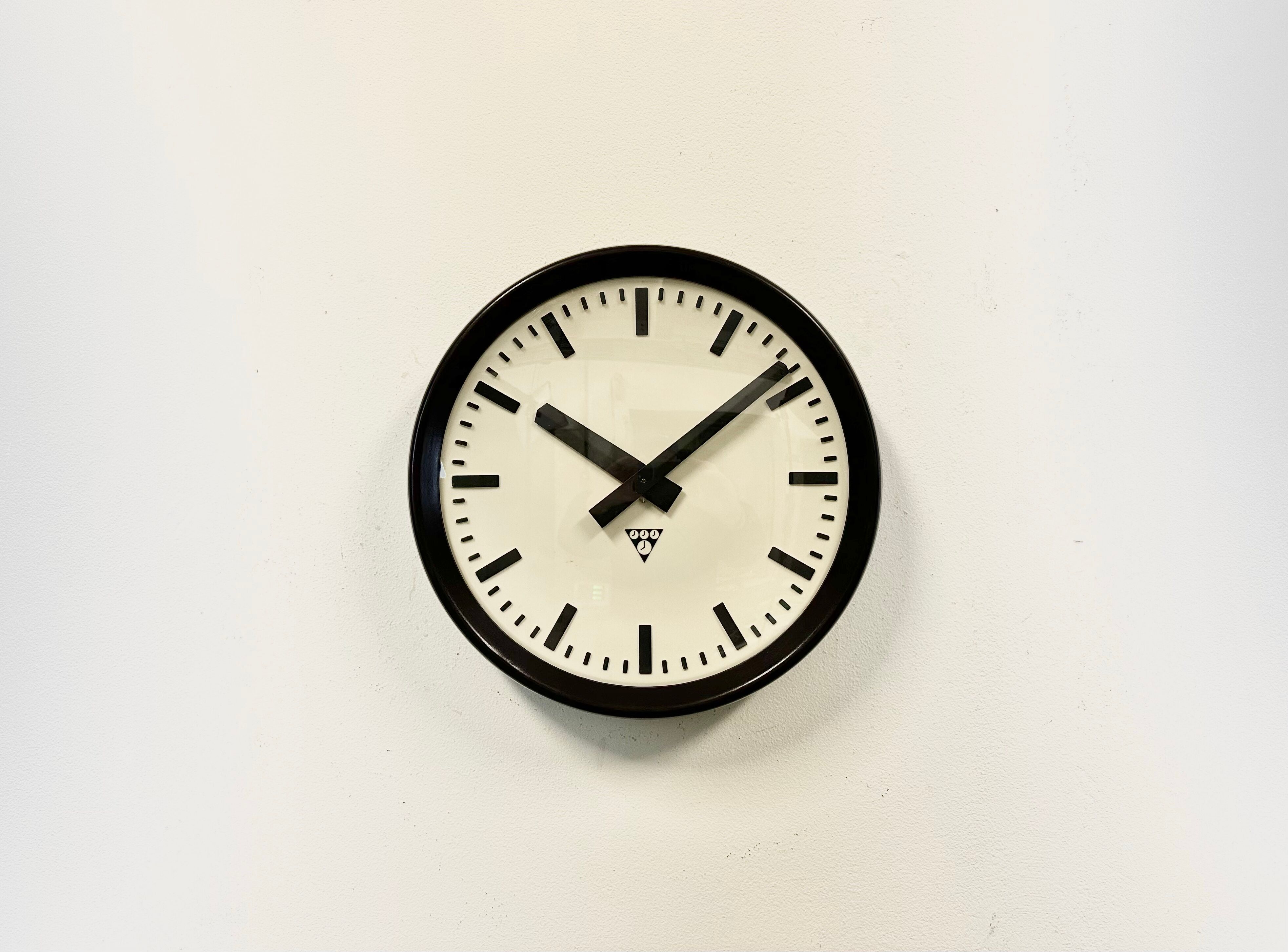 Industrial bakelite factory wall clock from Pragotron, 1960s