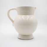 White pitcher in glazed stoneware