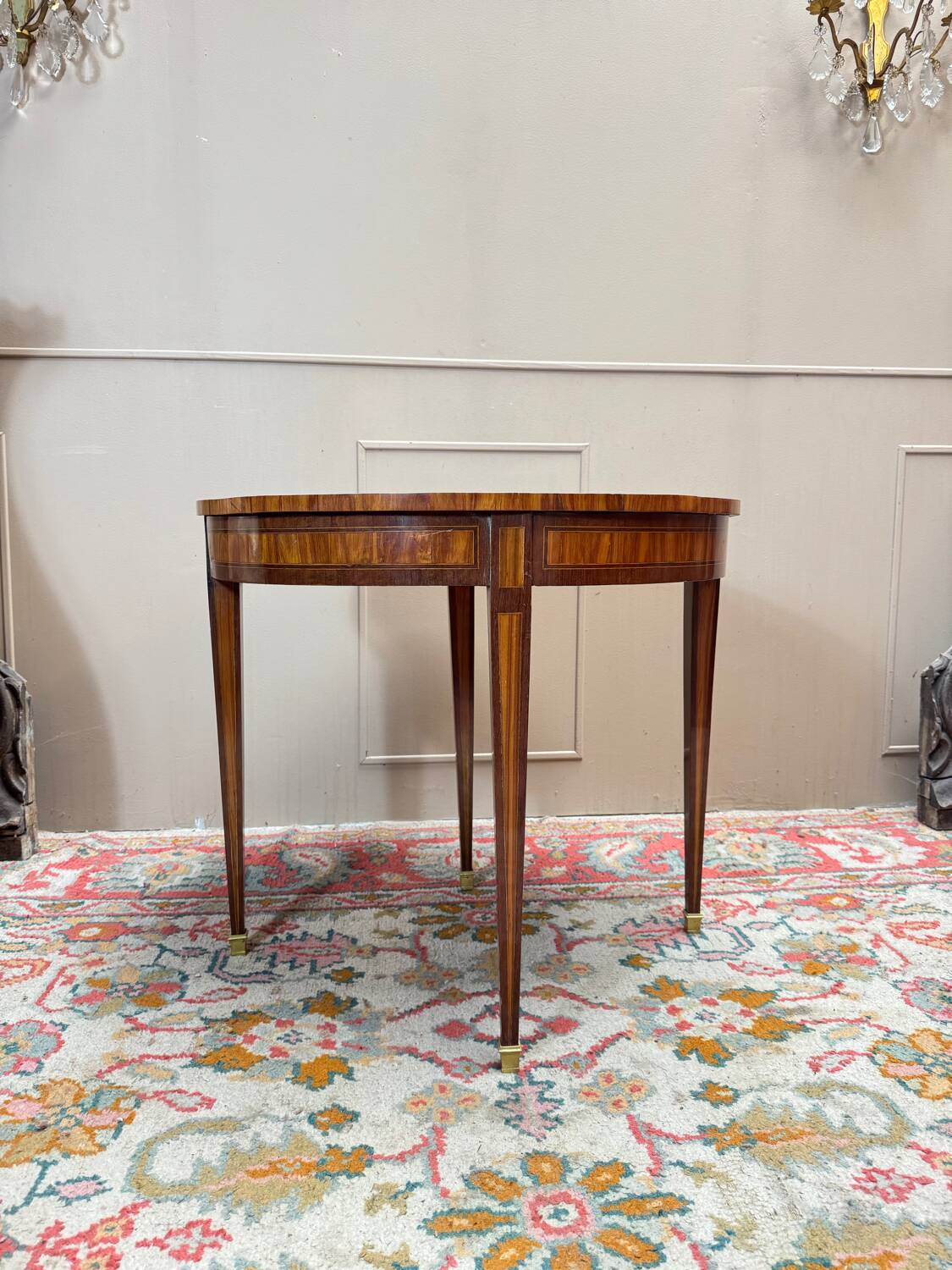Half-moon game table in marquetry from the Louis XVI period, 18th century.