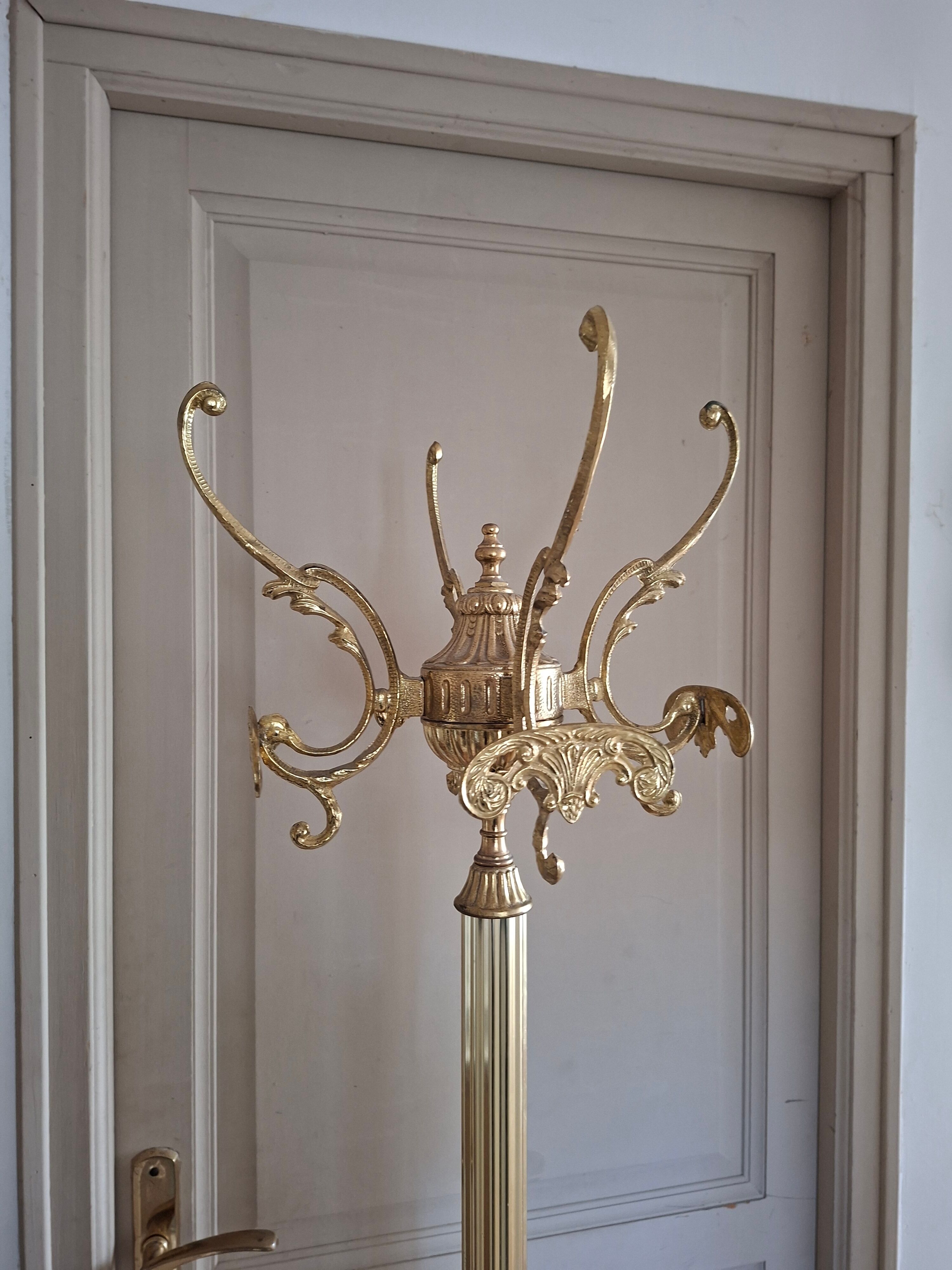 Golden parrot coat rack
