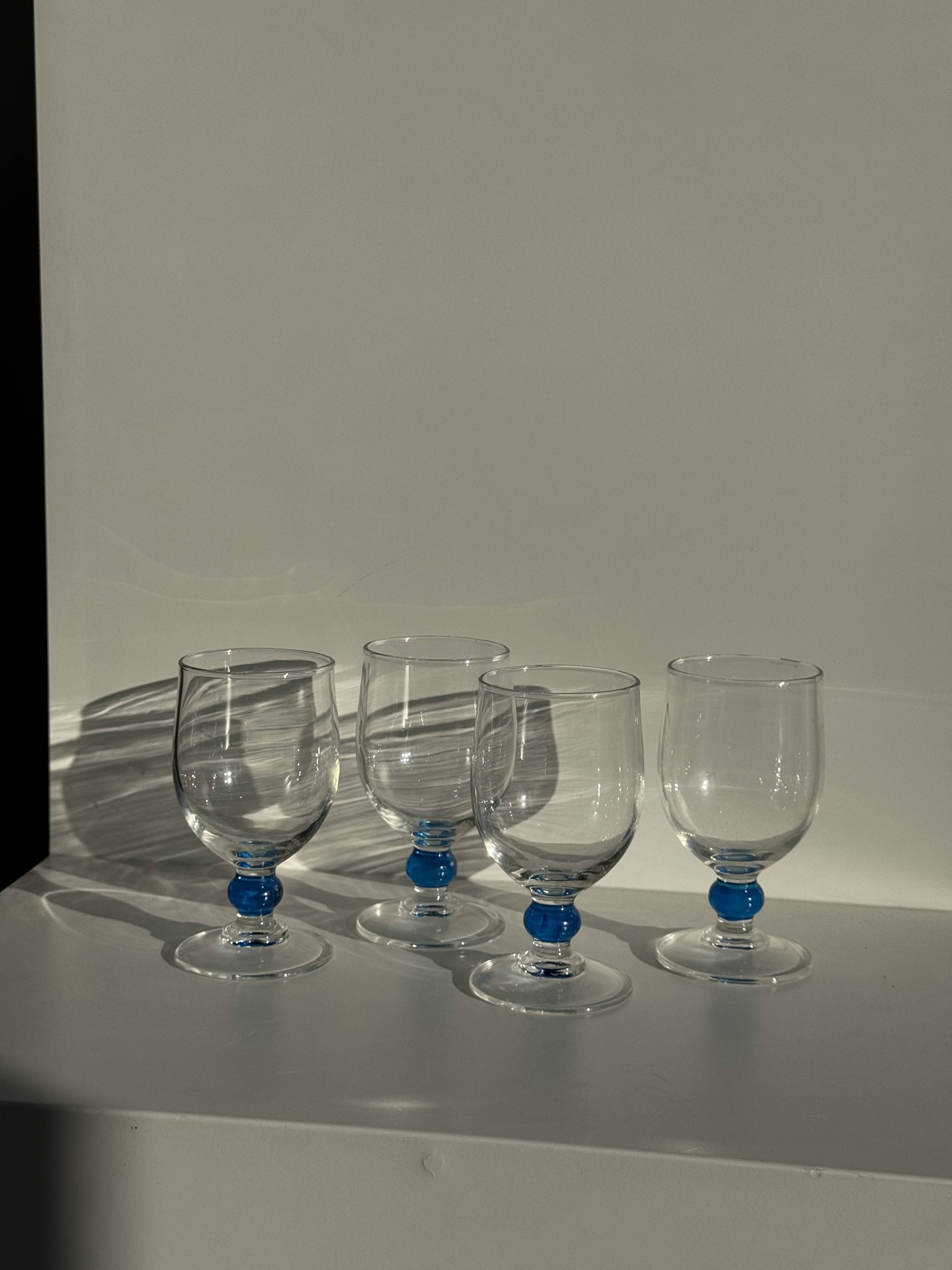 Set of 4 blue ball stemmed water glasses