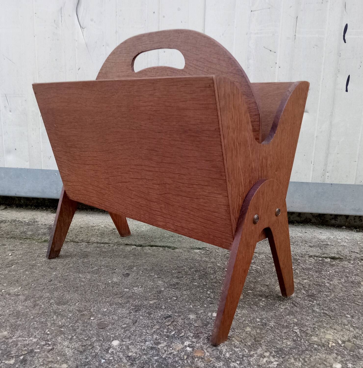 Vintage magazine rack with compass feet