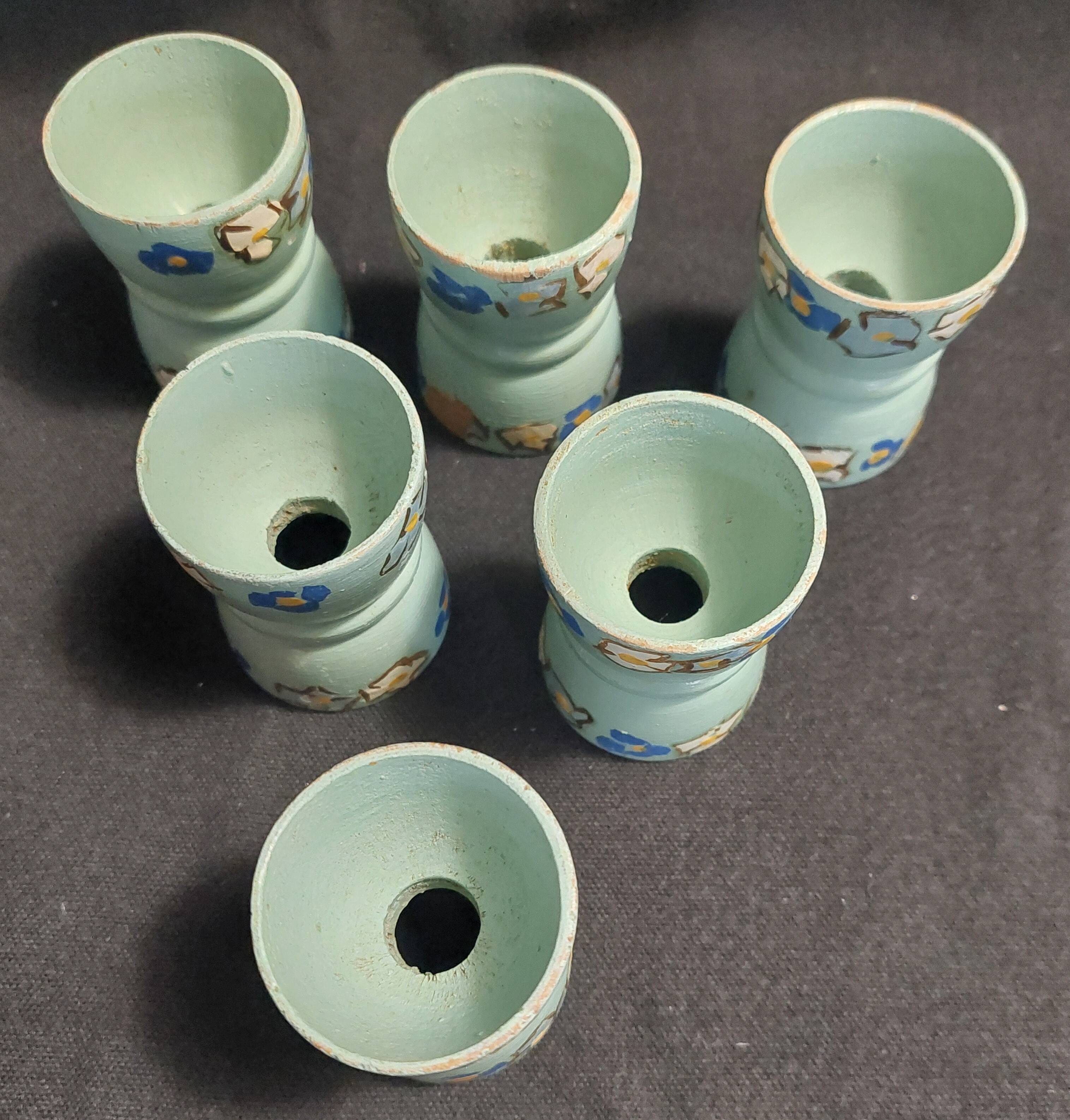 Antique painted wooden egg cups, set of six from the 1930s.