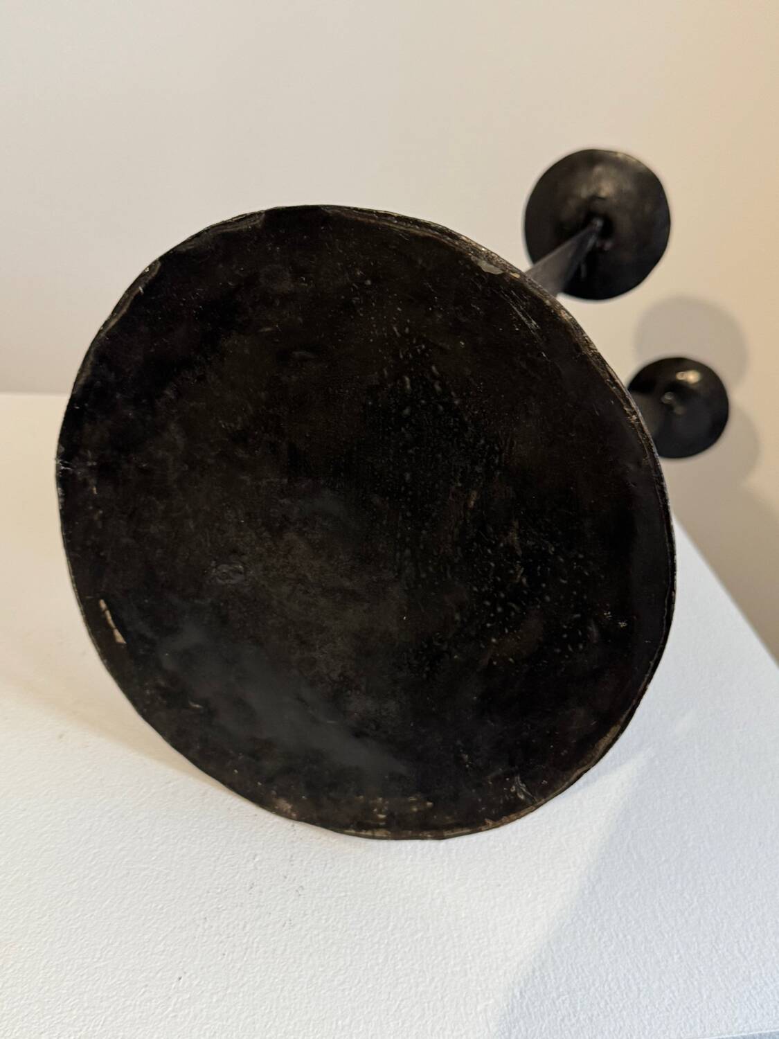 Vintage black metal brutalist tripod candlestick