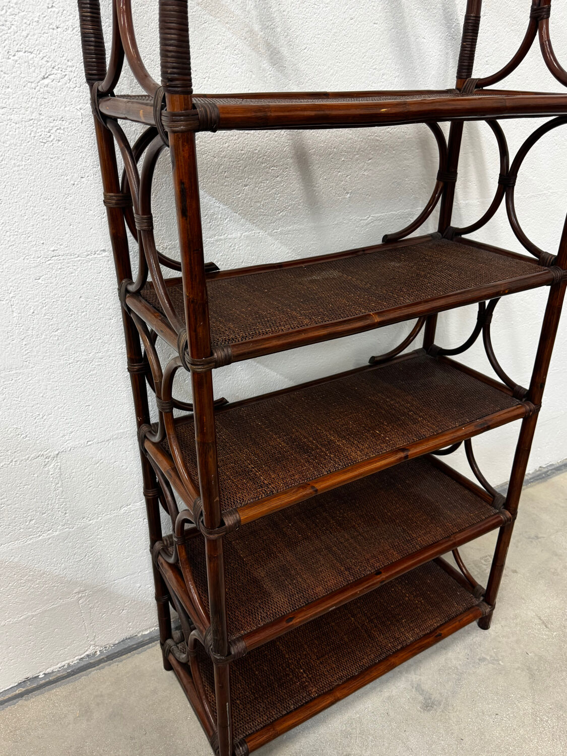 Dark rattan and bamboo bookshelf shelf