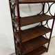 Dark rattan and bamboo bookshelf shelf