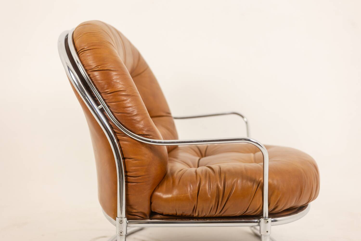 Carlo Di Carli. Leather and metal armchair. 1970s.