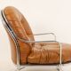 Carlo Di Carli. Leather and metal armchair. 1970s.