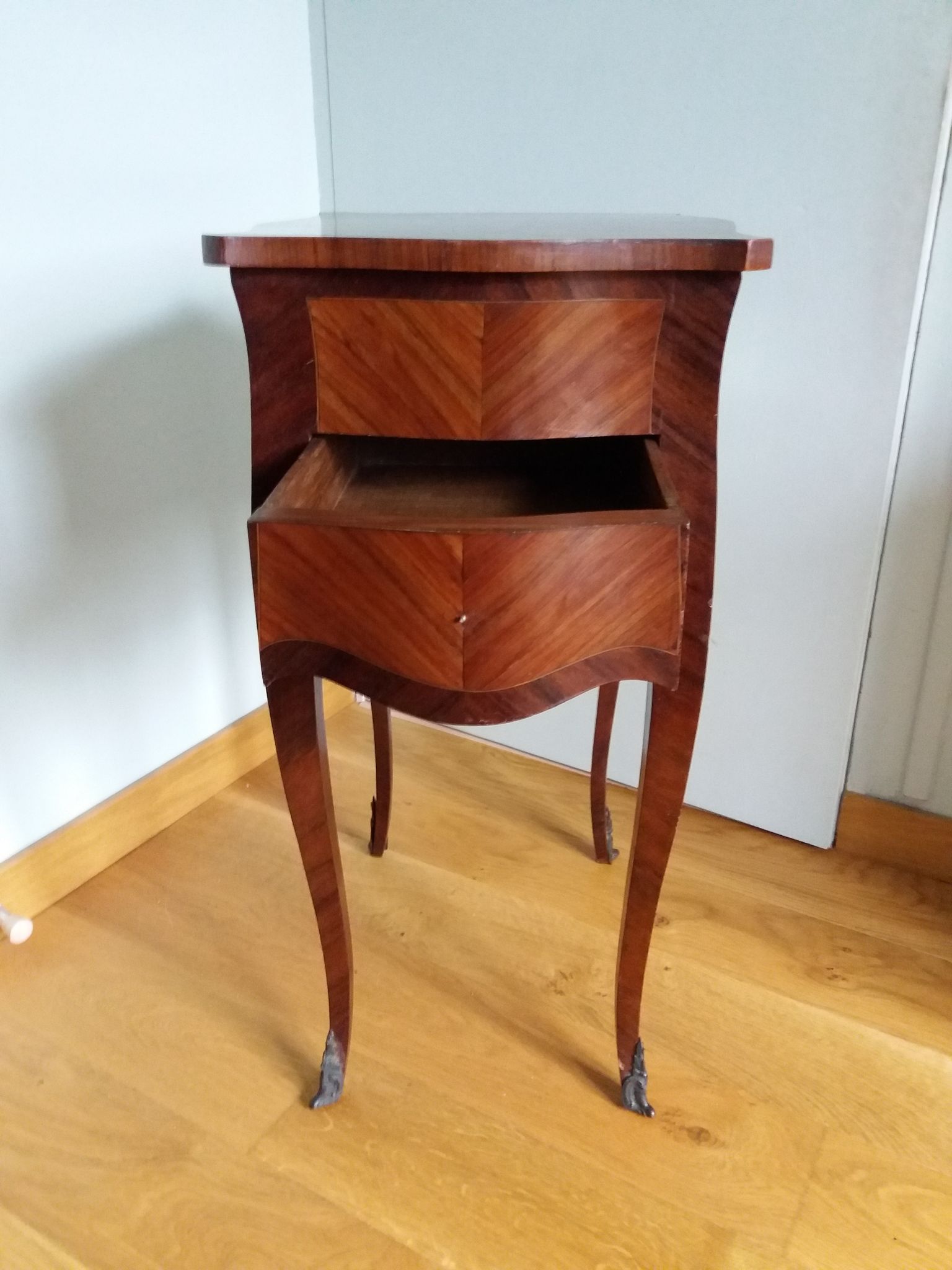 Nightstand with writing desk in Louis XV style.