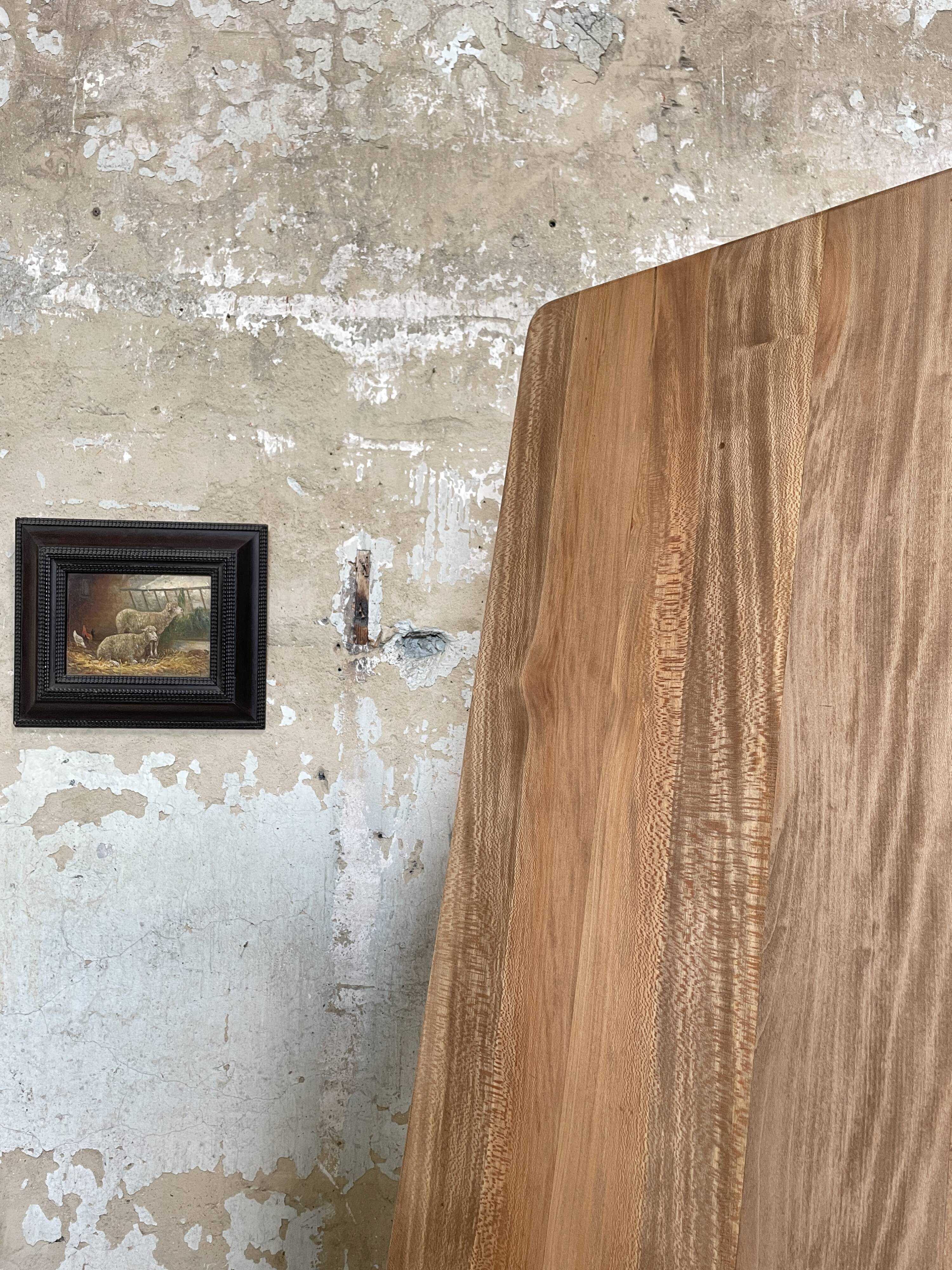 Vintage farmhouse table with turned legs.