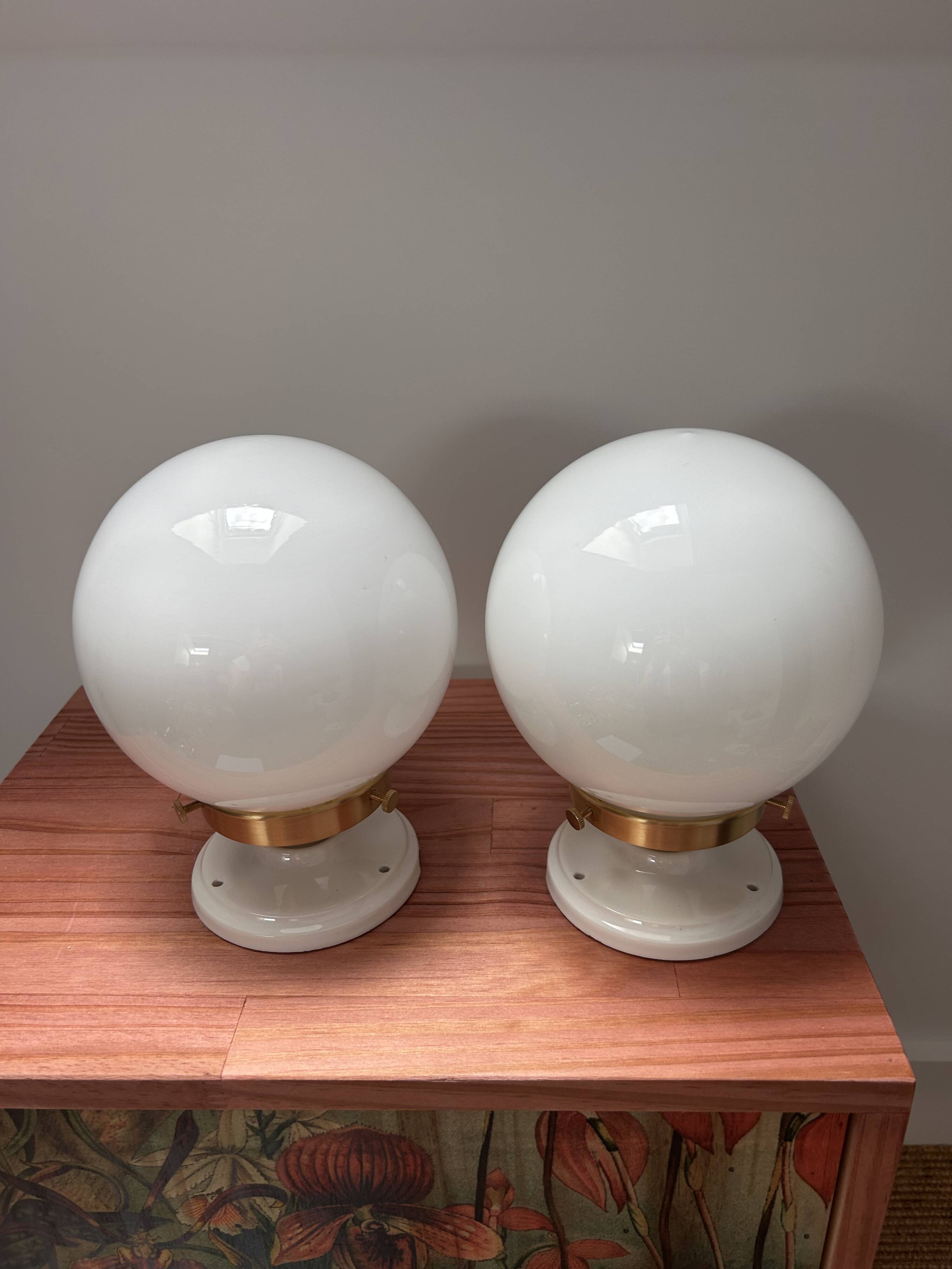 Set of two white opaline ball wall lights