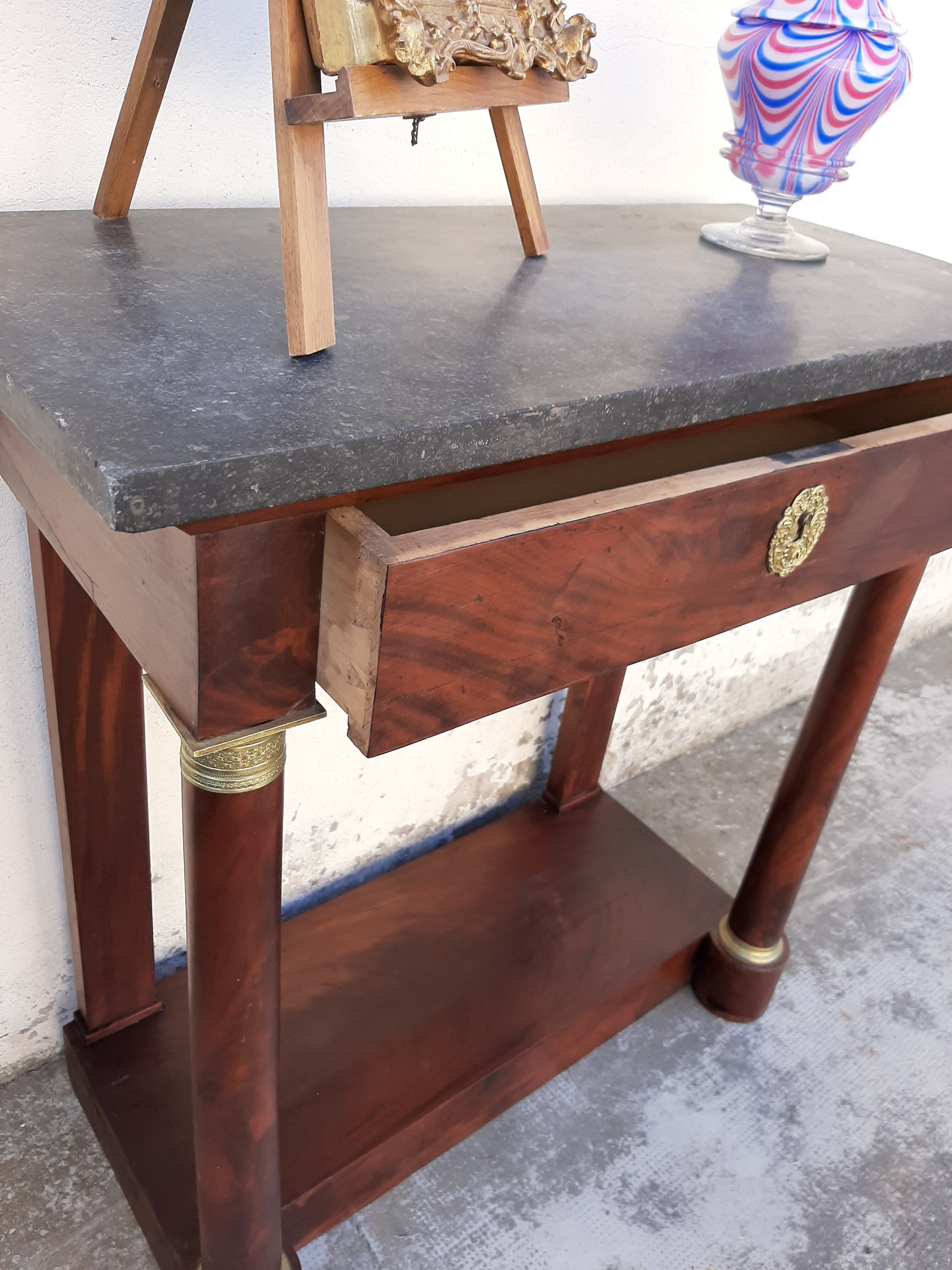 Empire console with column 1900