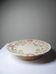 Short antique Longchamp stand with polychrome daisies in earthenware.