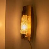 Vintage glass wall sconce from the 1960s in brass, mid-century light.