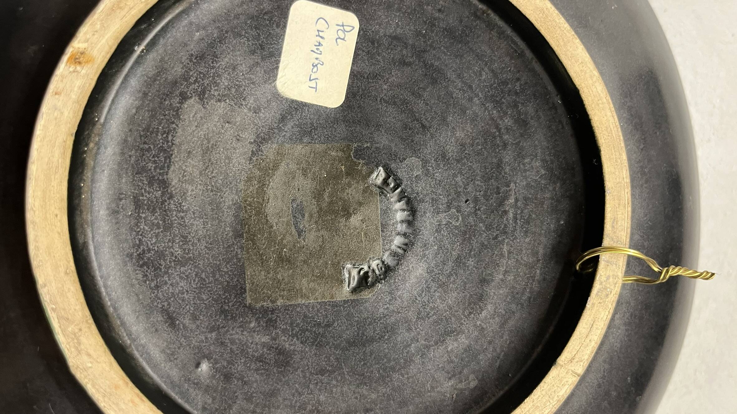 Wall plate by Pol Chambost with leaf pattern.