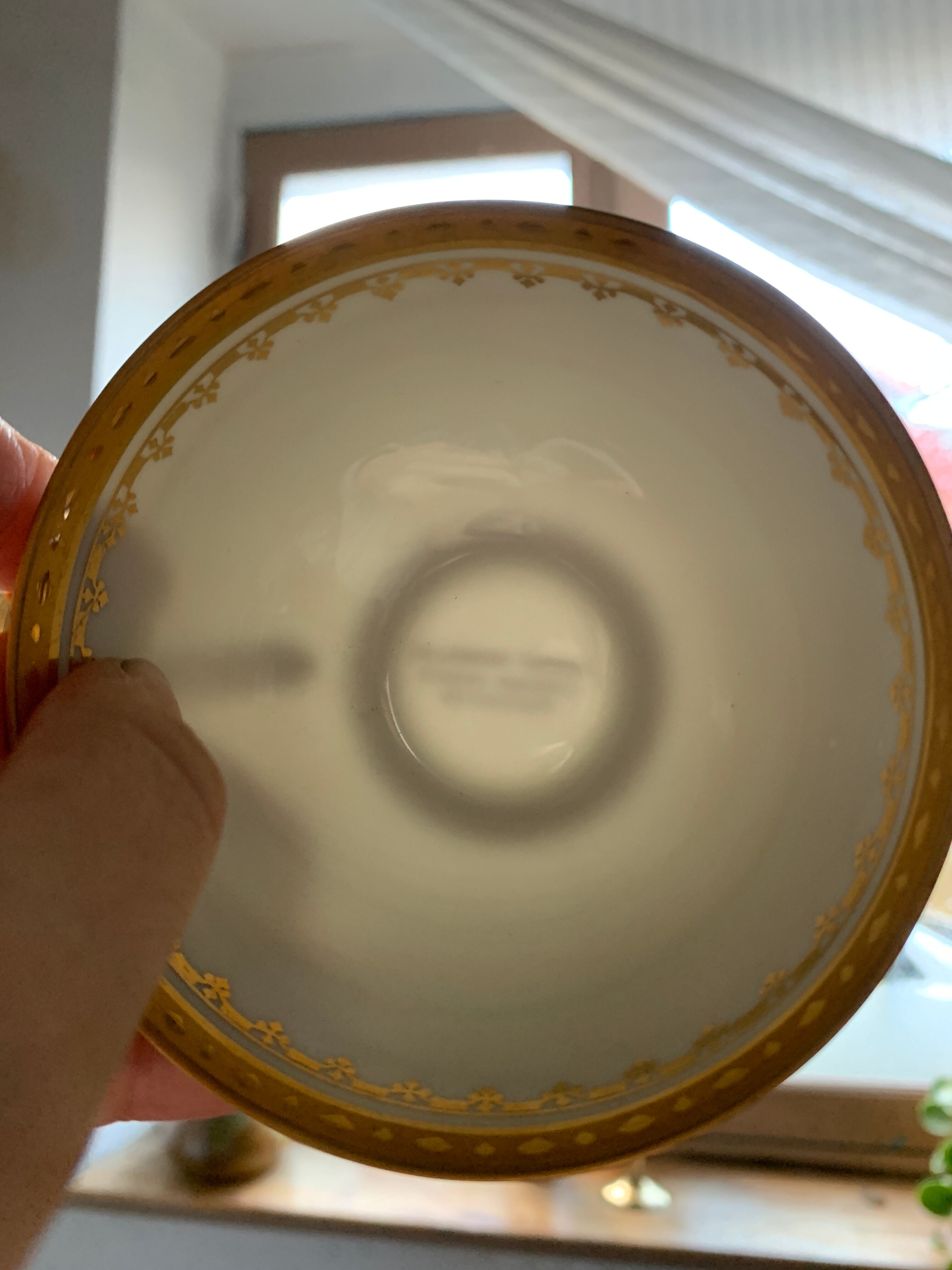 6 cups and golden porcelain saucers