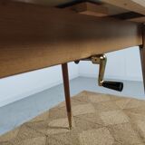 Adjustable vintage table with formica extension cords