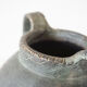 Vase with double handle in black sandstone