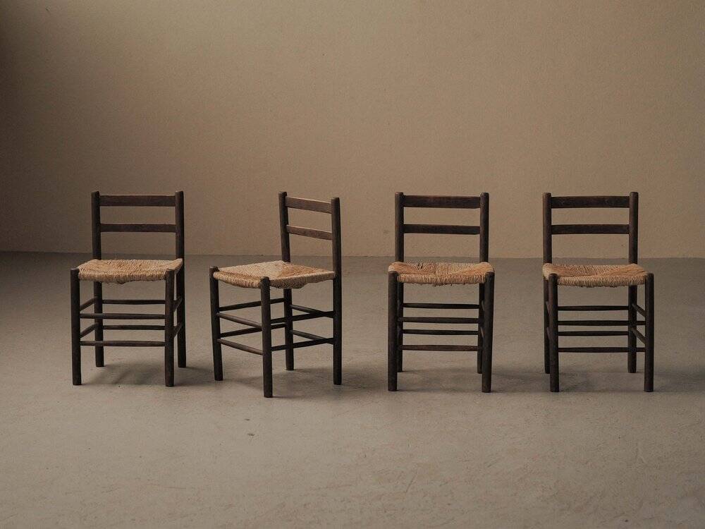 Set of four wooden and straw chairs, around 1960.