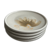 Set of 4 vintage ceramic plates by Sarreguemines from the 1970s with floral designs.