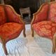 Pair of louis xv cabriolet armchairs with sculpted wood and pink & red floral fabric