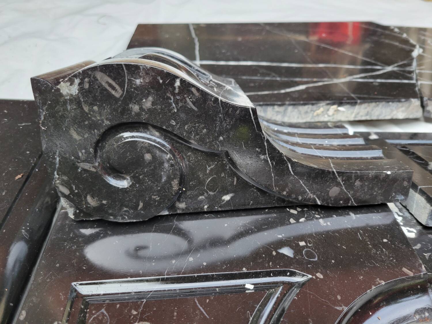 Pompadour fireplace with black marble modillions