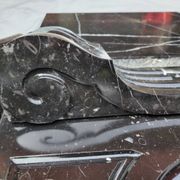 Pompadour fireplace with black marble modillions