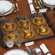 Mid-century tea service in patinated brass and glass