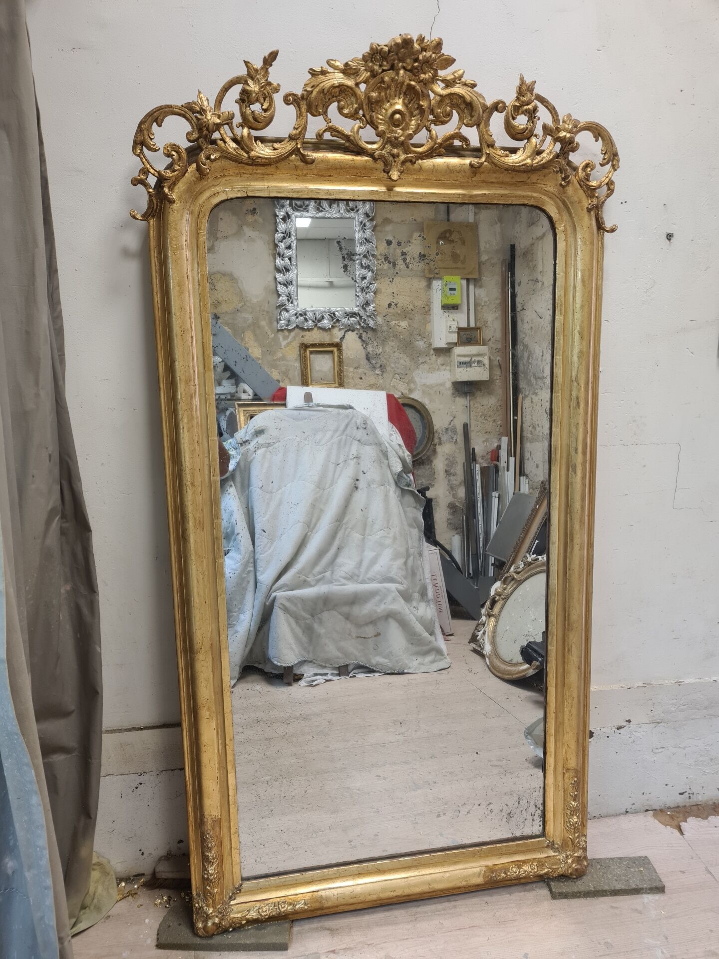 Large antique gilded mirror in Louis Philippe style