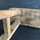 Ancient Chinese farm bench in patinated wood, small rustic stool.