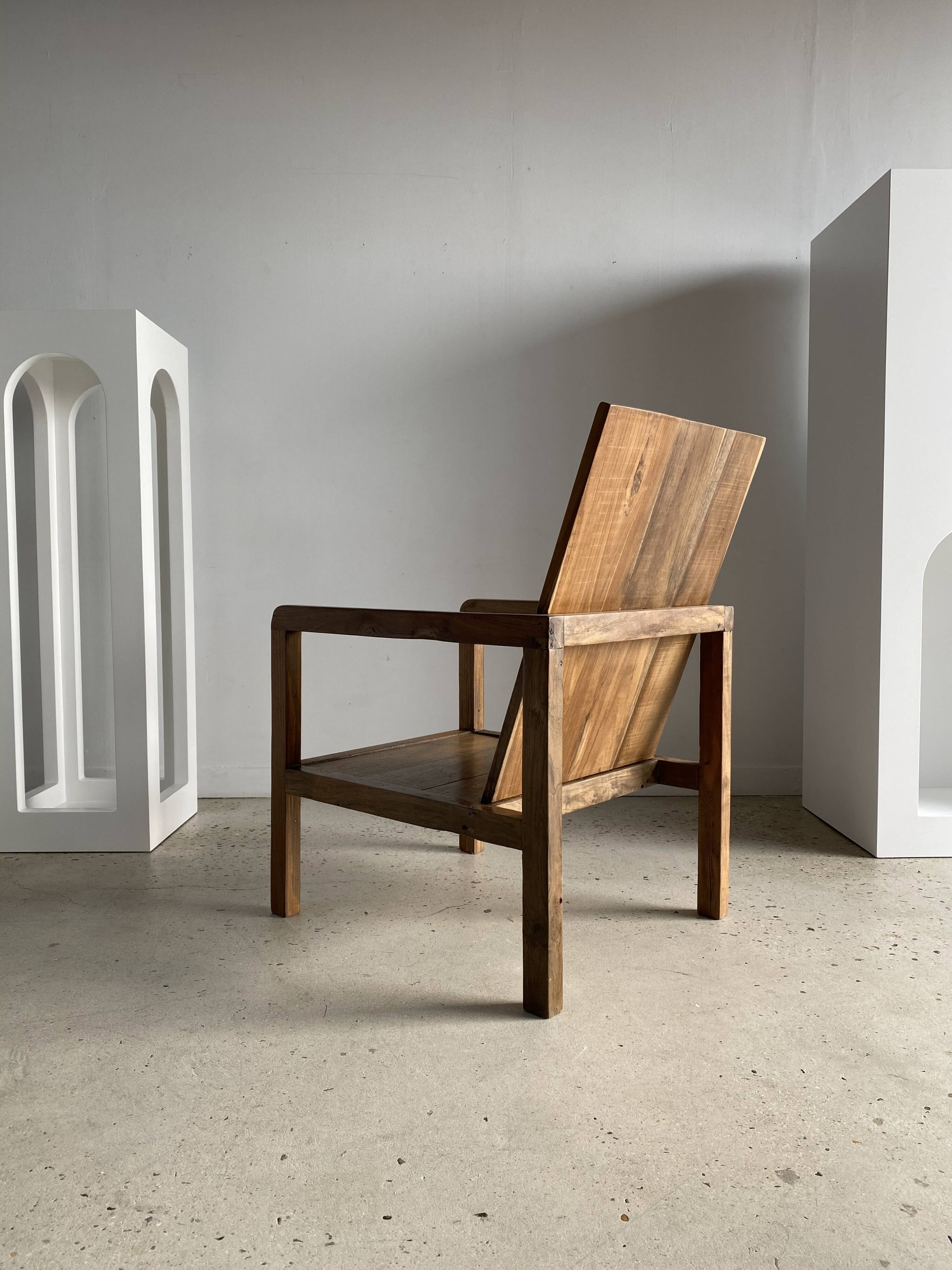 Armchair in natural wood (teak) minimalist design