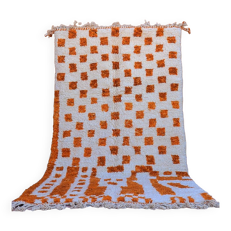 Modern checkered orange and white Moroccan Berber rug