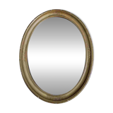 Oval mirror in gilded stucco 45 cm