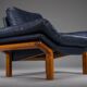 Danish teak and navy blue leather lounge chair from Komfort, 1970s