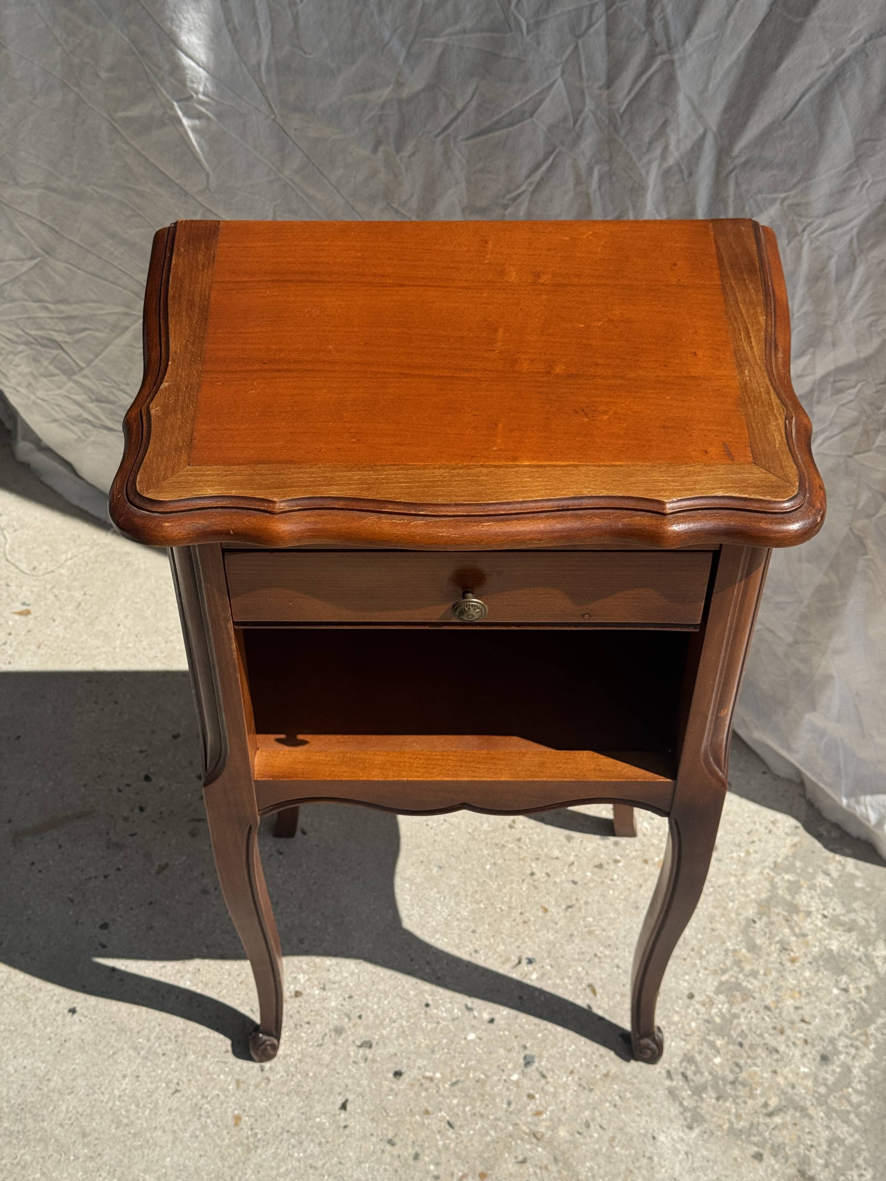 Classic wooden bedside table with drawer