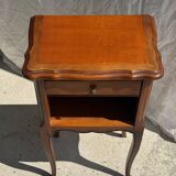 Classic wooden bedside table with drawer