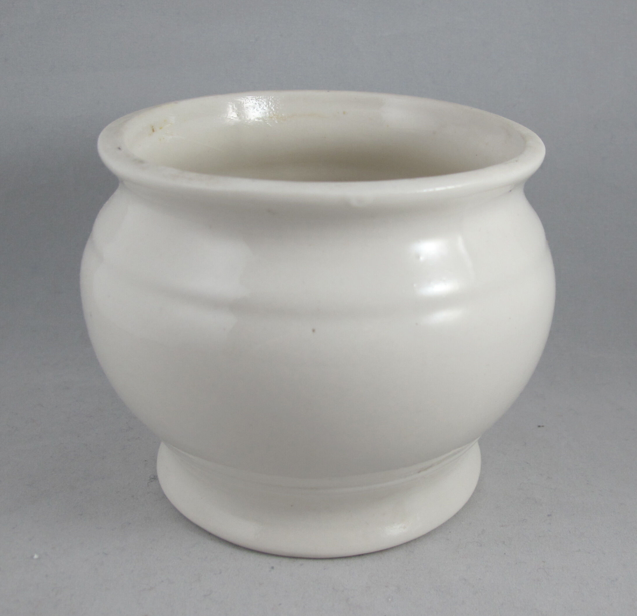 small vase or white porcelain pot