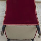 Bergère with blackened wooden legs on casters, Napoleon III period, velvet upholstery