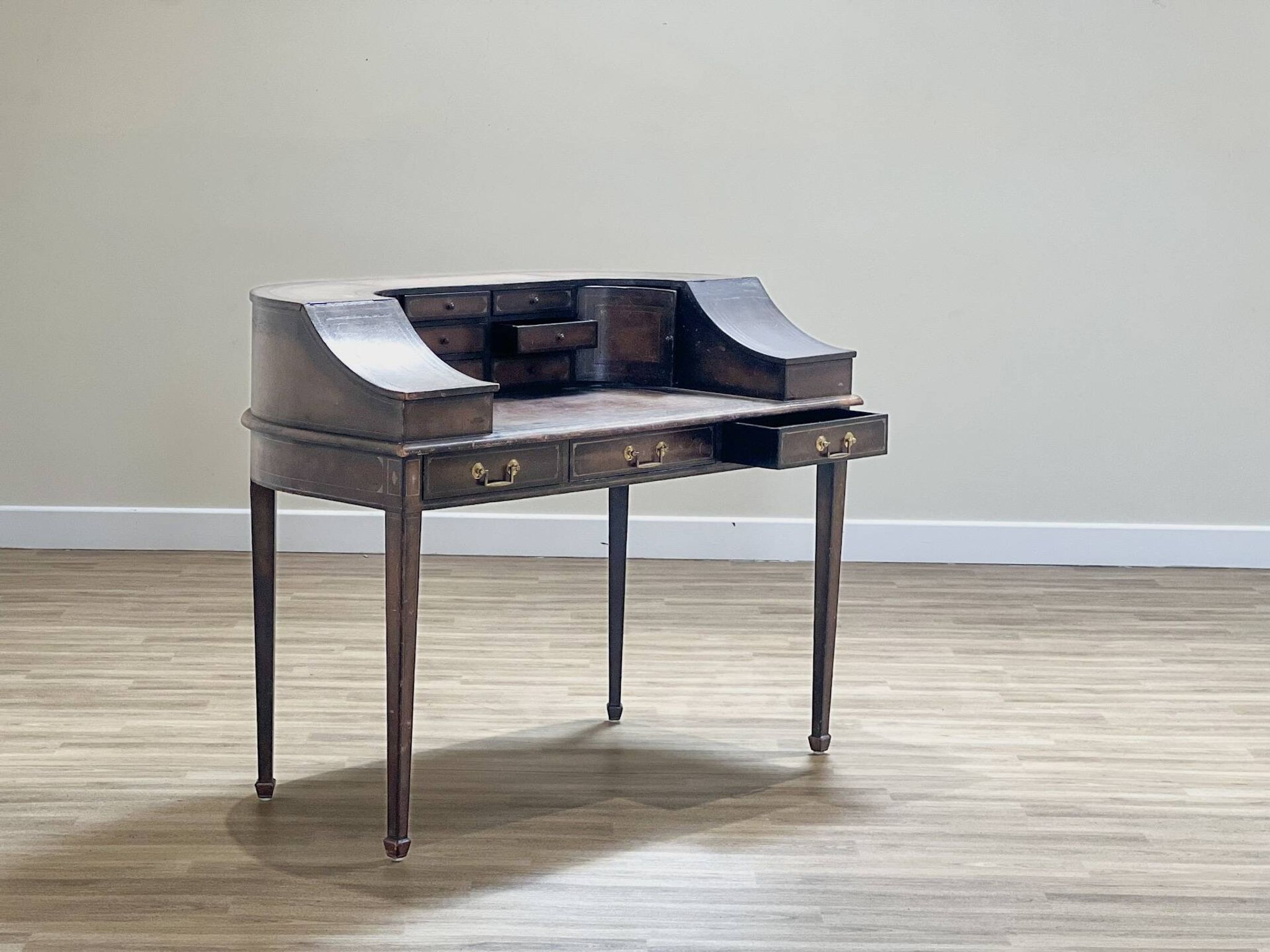 Antique desk by Charles Lowe & Sons
